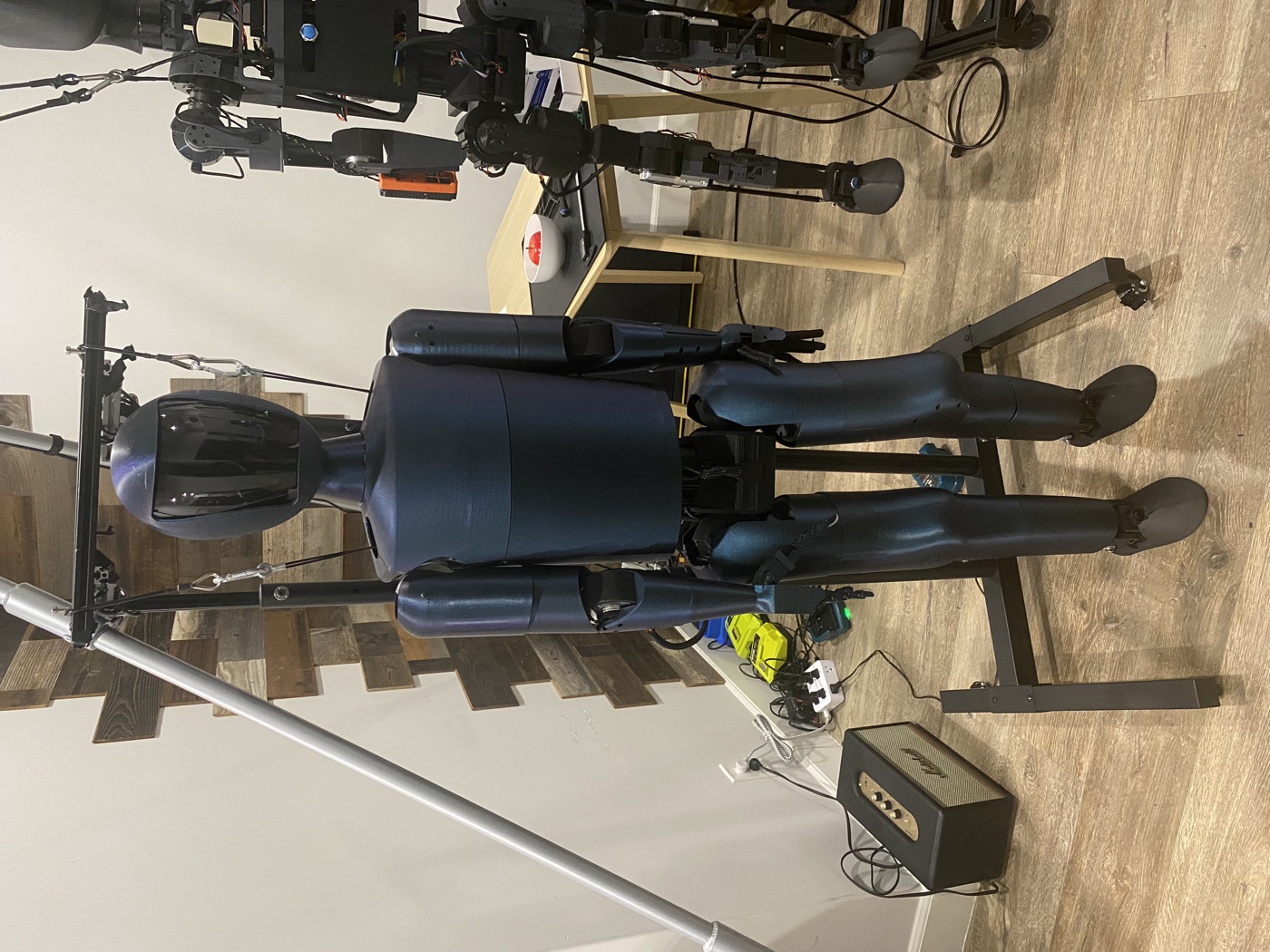 Two generations of the humanoid robot side by side